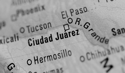 Close of a black and white map with “Ciudad Juarez” in bold.