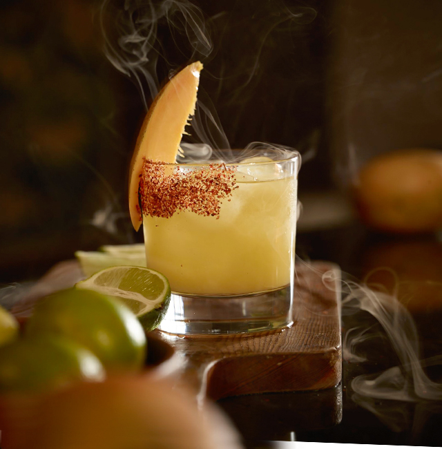 Smoked Mangonada Margarita Cocktail Recipe | Patr贸n Tequila Smoked Mangonada Margarita Cocktail Recipe | Patr贸n Tequila